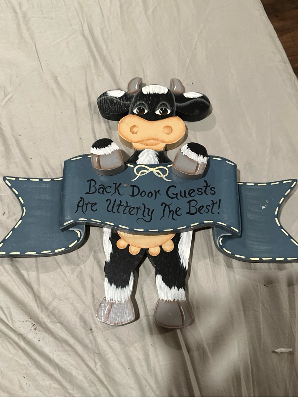 Vintage hand painted wooden cow wall art